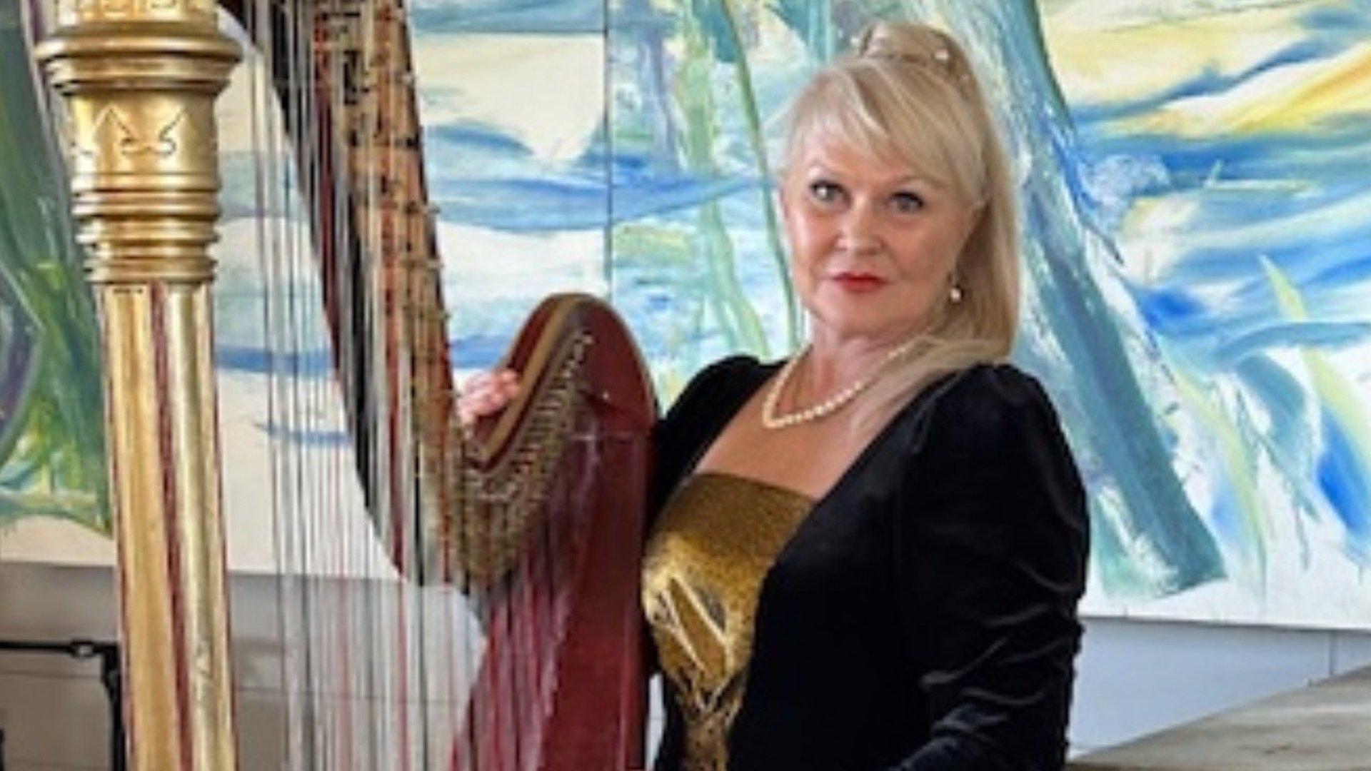 Maria Sidorova med en harpa