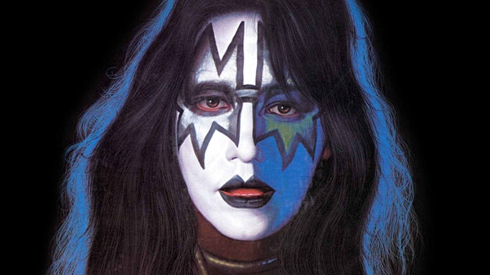 En bild på Ace Frehley i karaktäristisk sminkning från albumomslag.