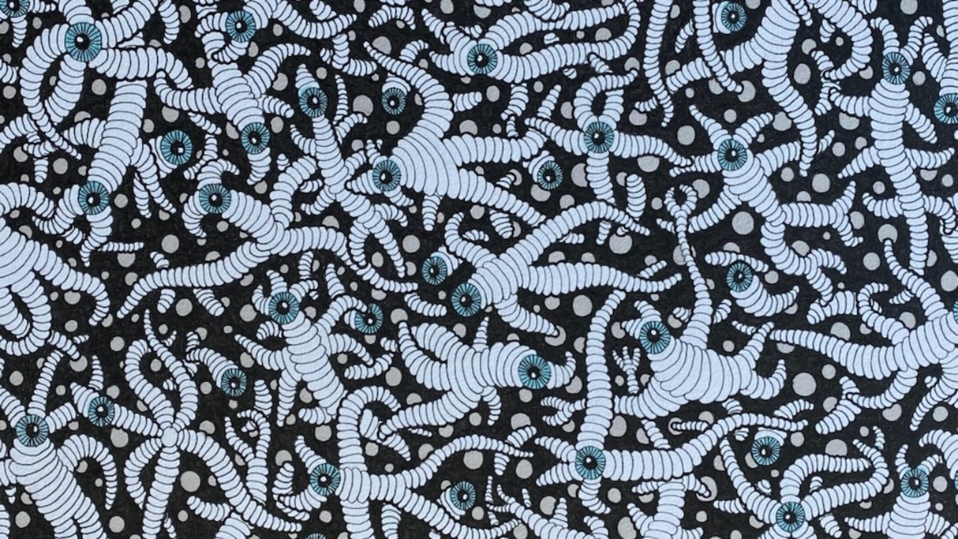 Bild av Roger Stenberg. Mystiska figurer, liknande maskar som klotter.